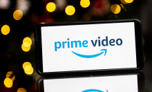 In this photo illustration a Prime Video logo seen displayed on a smartphone
