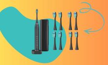 sonic toothbrush and eight replacement heads on a colorful background