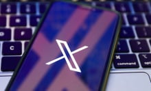 X logo on mobile device