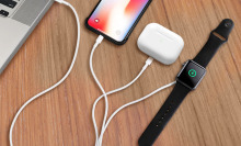 iphone, airpods and apple watch on 3-in-1 charger