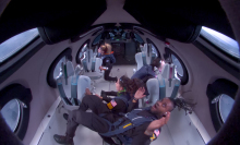 Astronauts in weightlessness in a Virgin Galactic flight.
