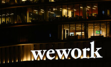 WeWork logo is seen on an office building in Tel Aviv, Israel.