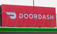 Doordash logo on billboard