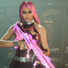 Nicki Minaj in Call of Duty: Modern Warfare II. She has pink hair, and is carrying a pink gun.