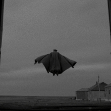 A vampire lifts off into the sky in the film "El Conde"