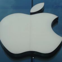 Apple logo on glass window
