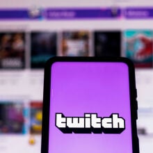 The Twitch logo seen displayed on a smartphone.