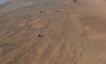 NASA's Ingenuity helicopter snapped this image of the Martian desert mid-flight.