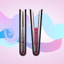 vertical dyson corrale hair straightener against pink background