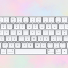 Apple Magic Keyboard on multicolor pastel background. 